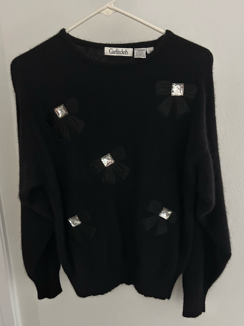 Black Crewneck Sweater with Jewel Bow Accents